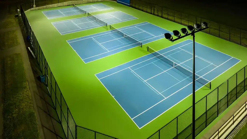 3 tennis courts with pickleball courts inside them